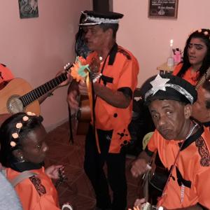 Visita à casa de devoto: canto das profecias